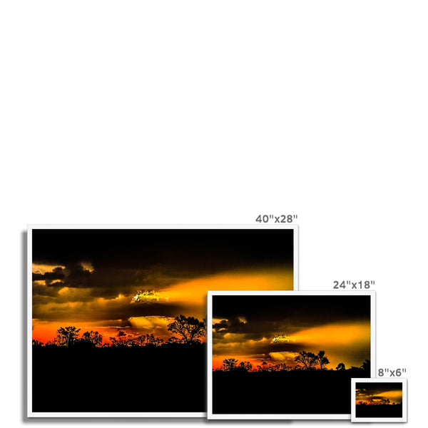 Sunset after the storm Framed Print