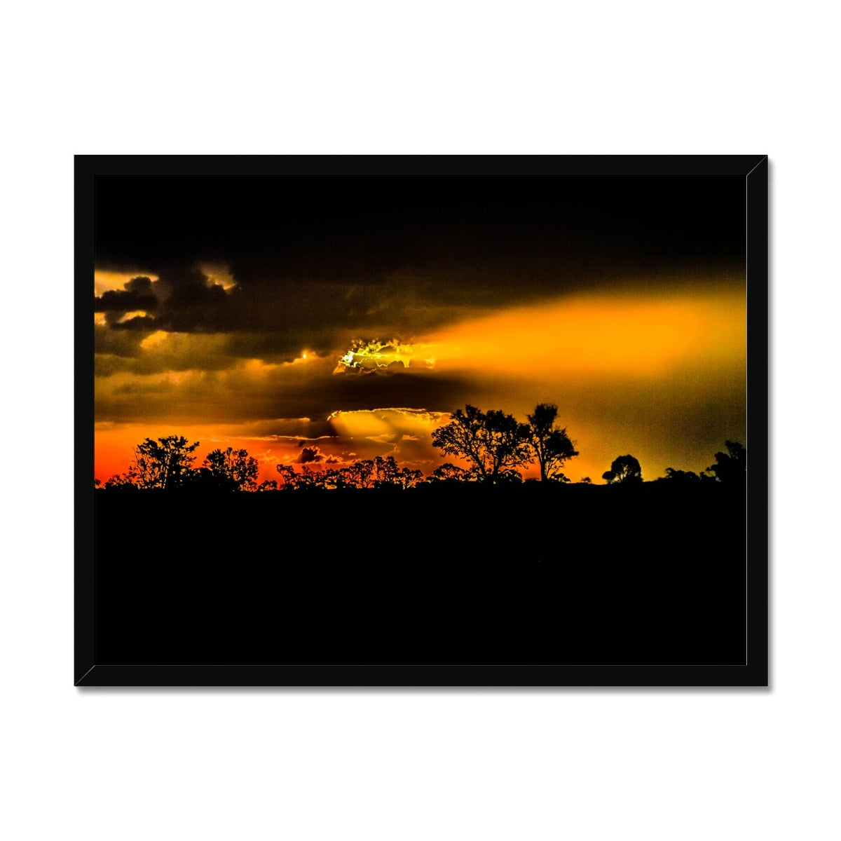 Sunset after the storm Framed Print