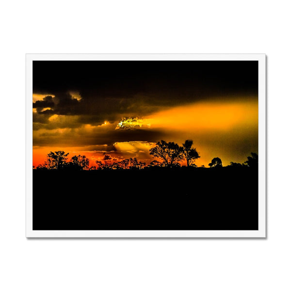 Sunset after the storm Framed Print